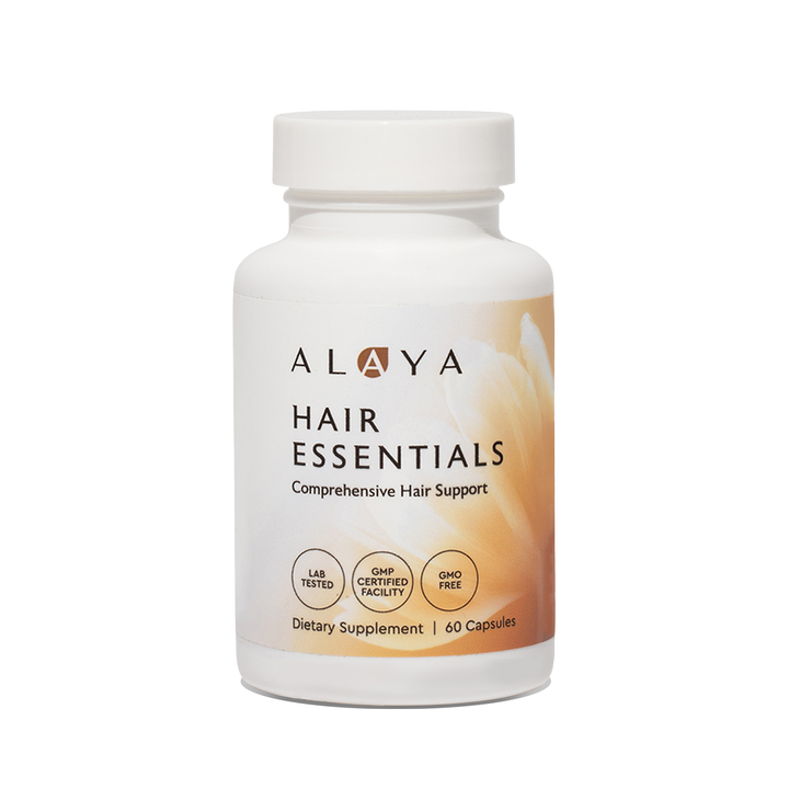 Alaya Hair Essentials supplement bottle on a clear background #hide