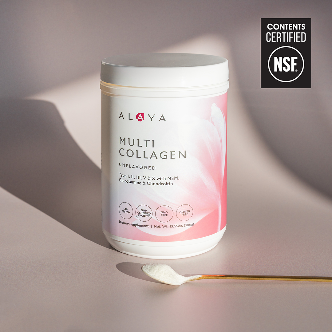 Alaya Multi Collagen Unflavored Powder supplement bottle on a dusty pink background with a gold spoon and powder  #flavor_unflavored #size_large